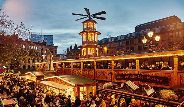 Christmas Market Illuminated at Night Albert Square Manchester UK